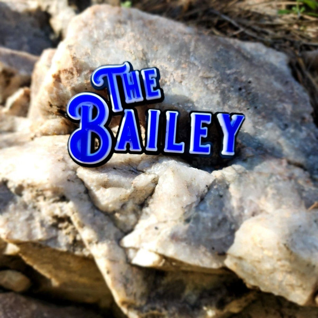 Text 'The Bailey' superimposed on a rocky background