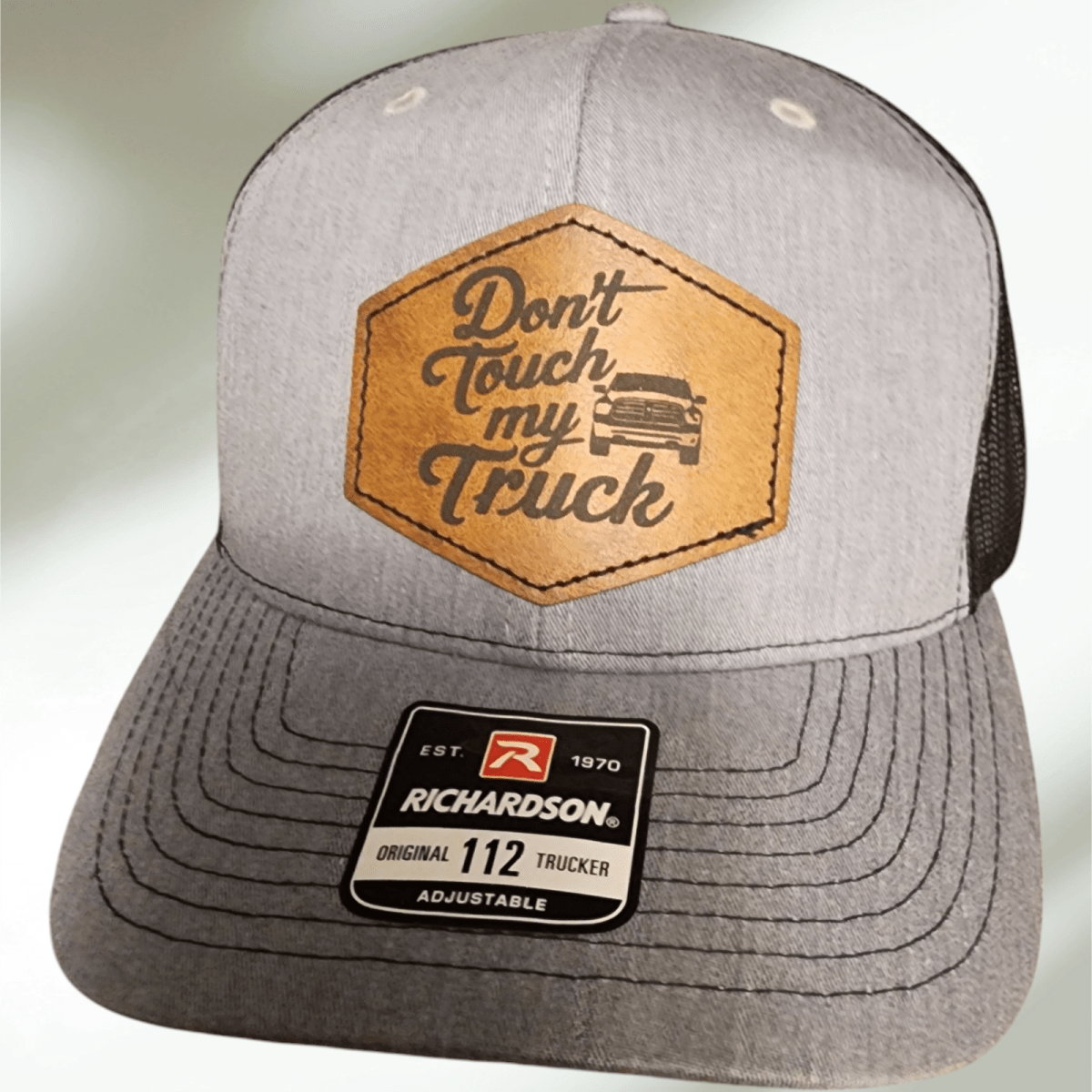 Custom Trucker Hat with Leather Patch & Metallic Detailing